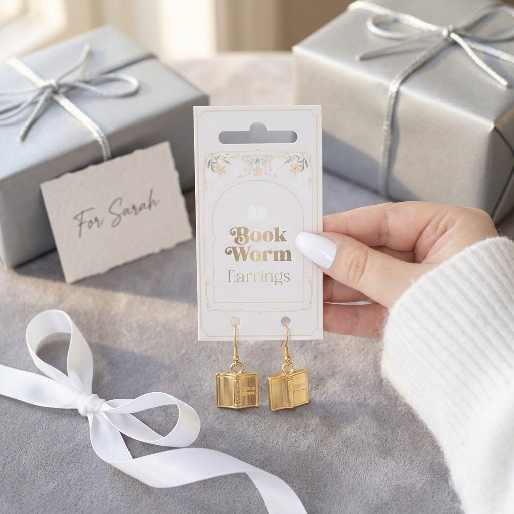 Gold Coloured Book Worm Dangle Earrings with Open Book Charms Gift for Book Lovers with silver wrapped background gifts