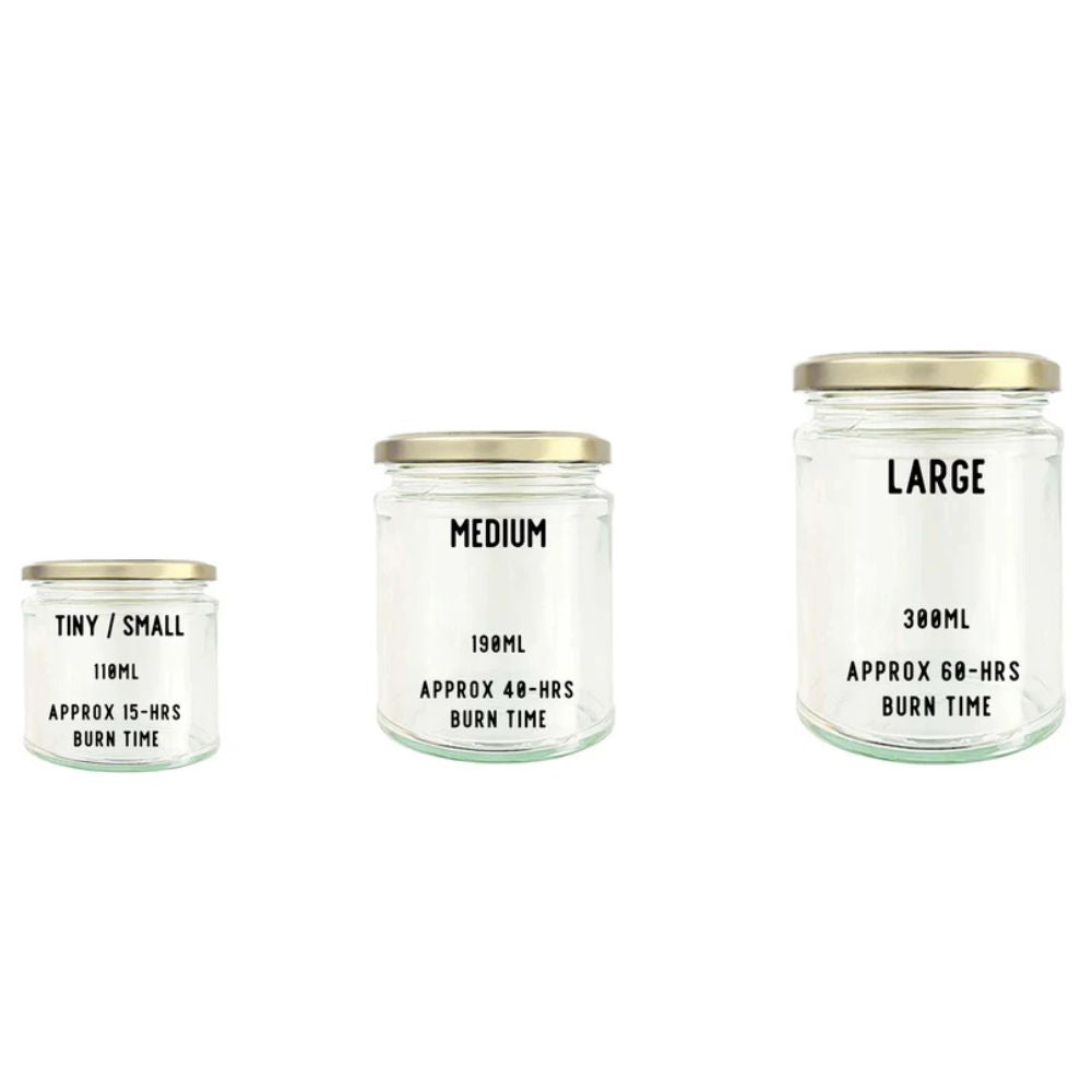 Art Soy Candle in Clear Glass Jar Handmade Scented Candle with Original Clay Artwork, Earthy Fragrance, wedding favour, Minimalist Home Décor - Artfully Curated Creations and identify whats in the image