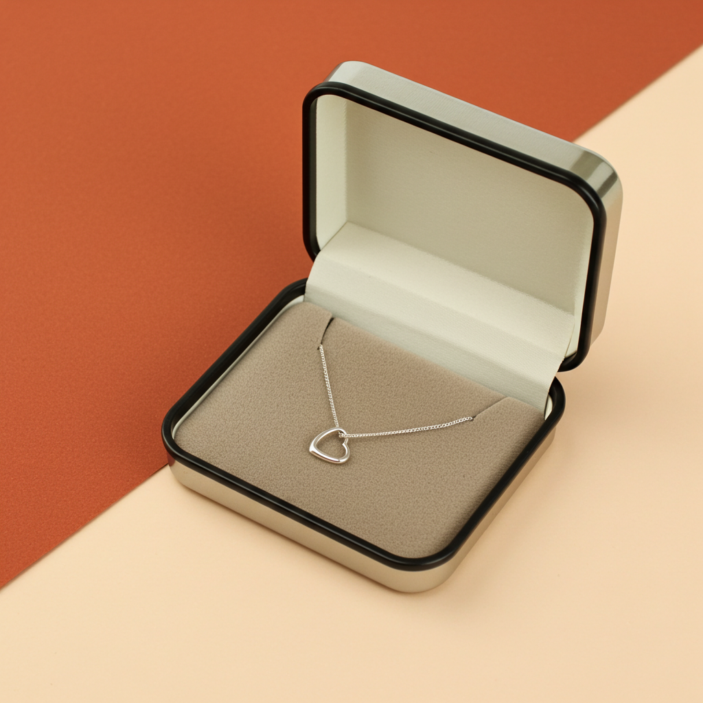 Personalised Sterling Silver Heart Necklace | Engraved Gift Box for Birthdays, Weddings & Mother’s Day - Artfully Curated Creations and identify whats in the image