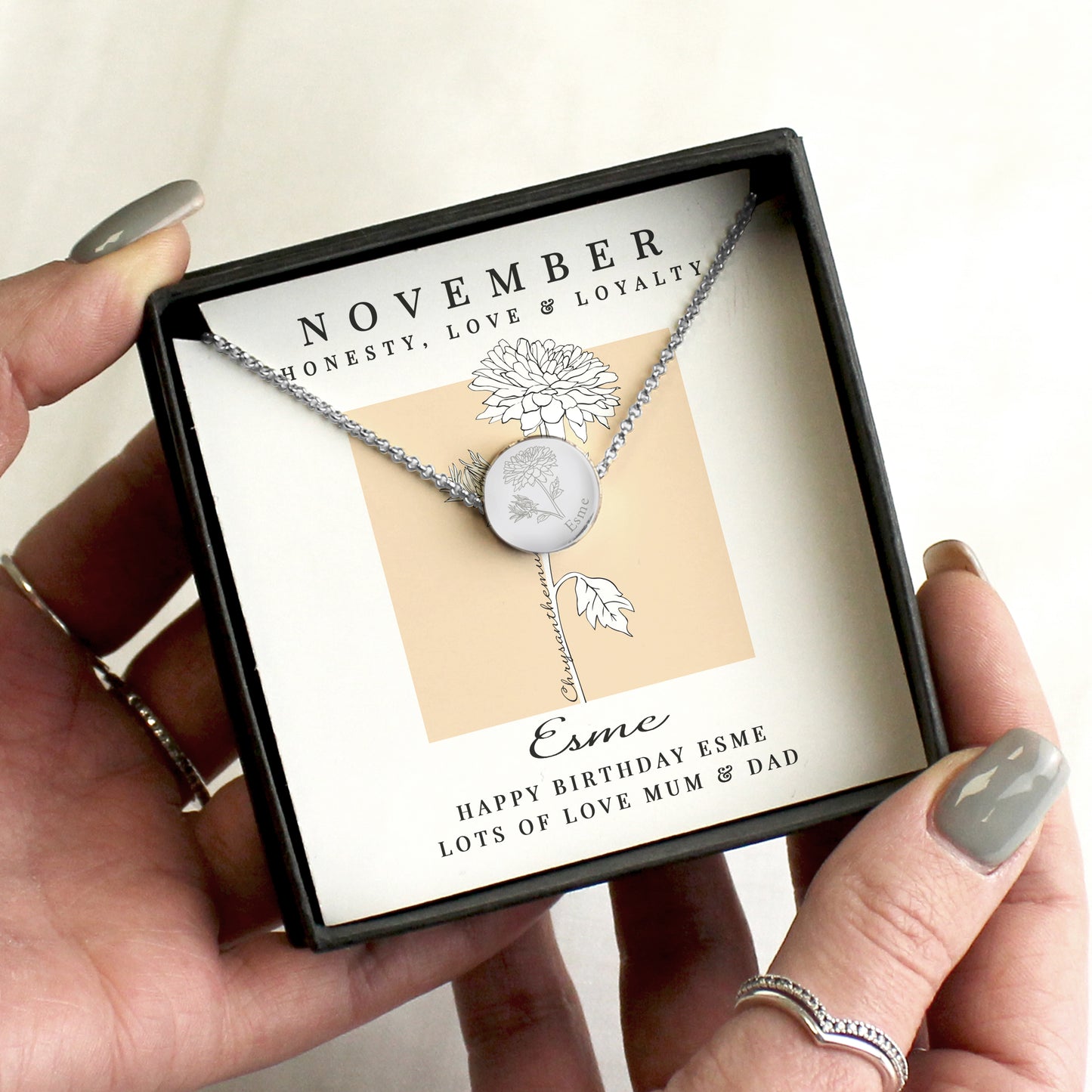 Personalised Birth Flower Necklace And Box | A personal gift - Artfully Curated Creations and identify whats in the image