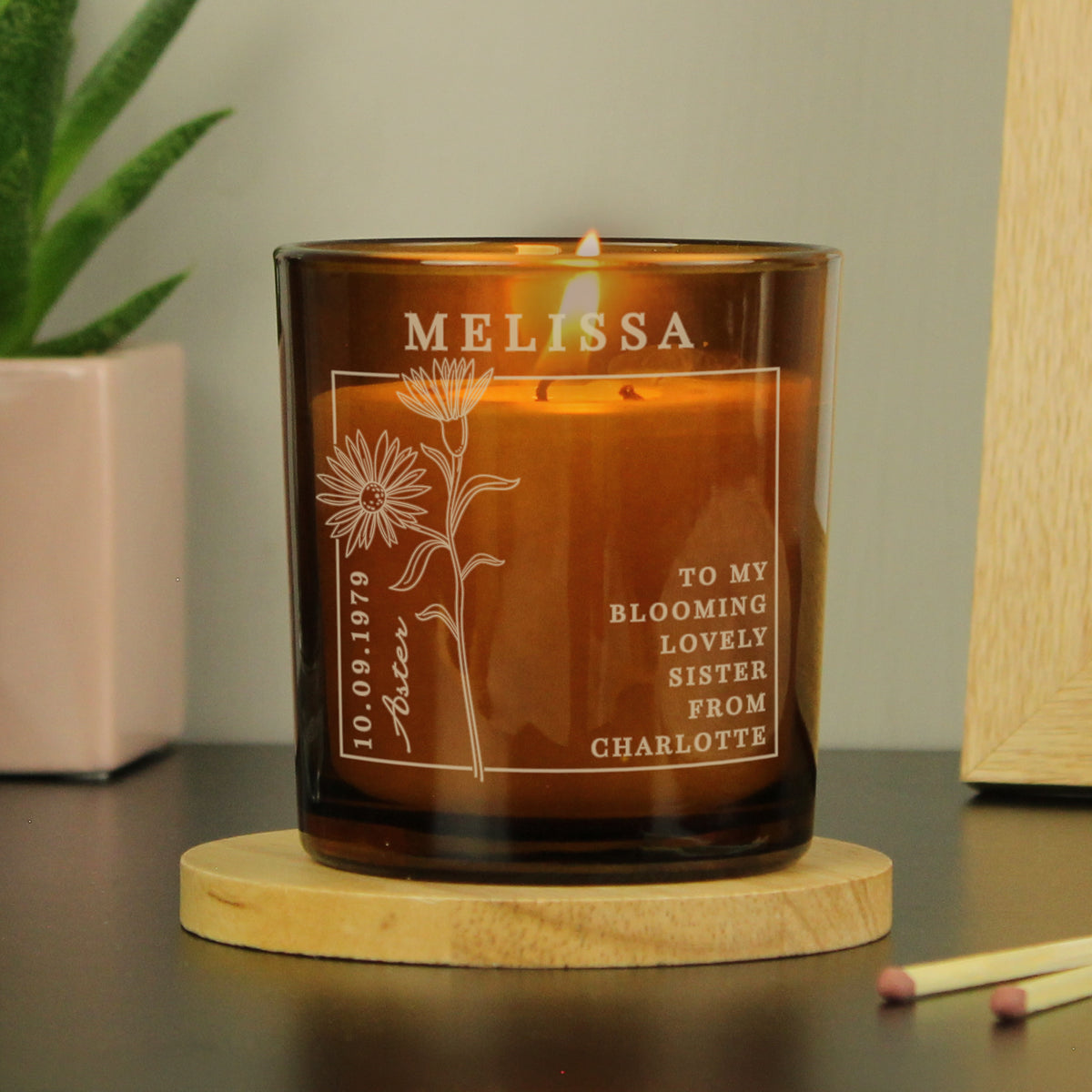 Personalised Birth Flower Candle in Amber Glass Jar | Handmade | A personal gift - Artfully Curated Creations and identify whats in the image
