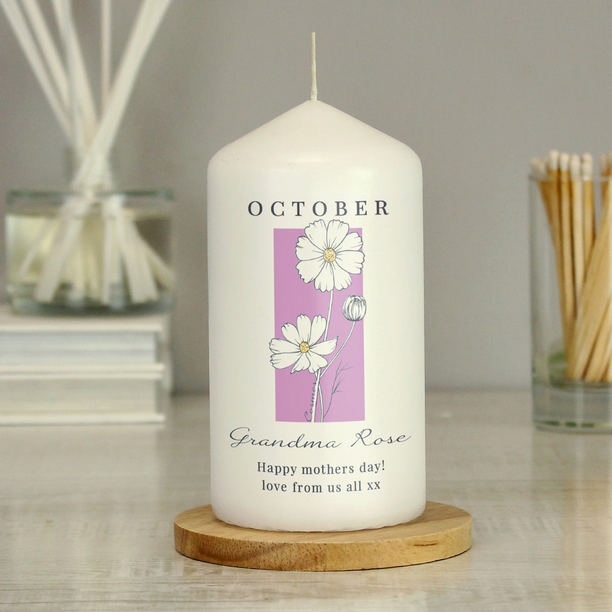 Personalised Birth Flower Pillar Candle | Handmade | A personal gift - Artfully Curated Creations and identify whats in the image
