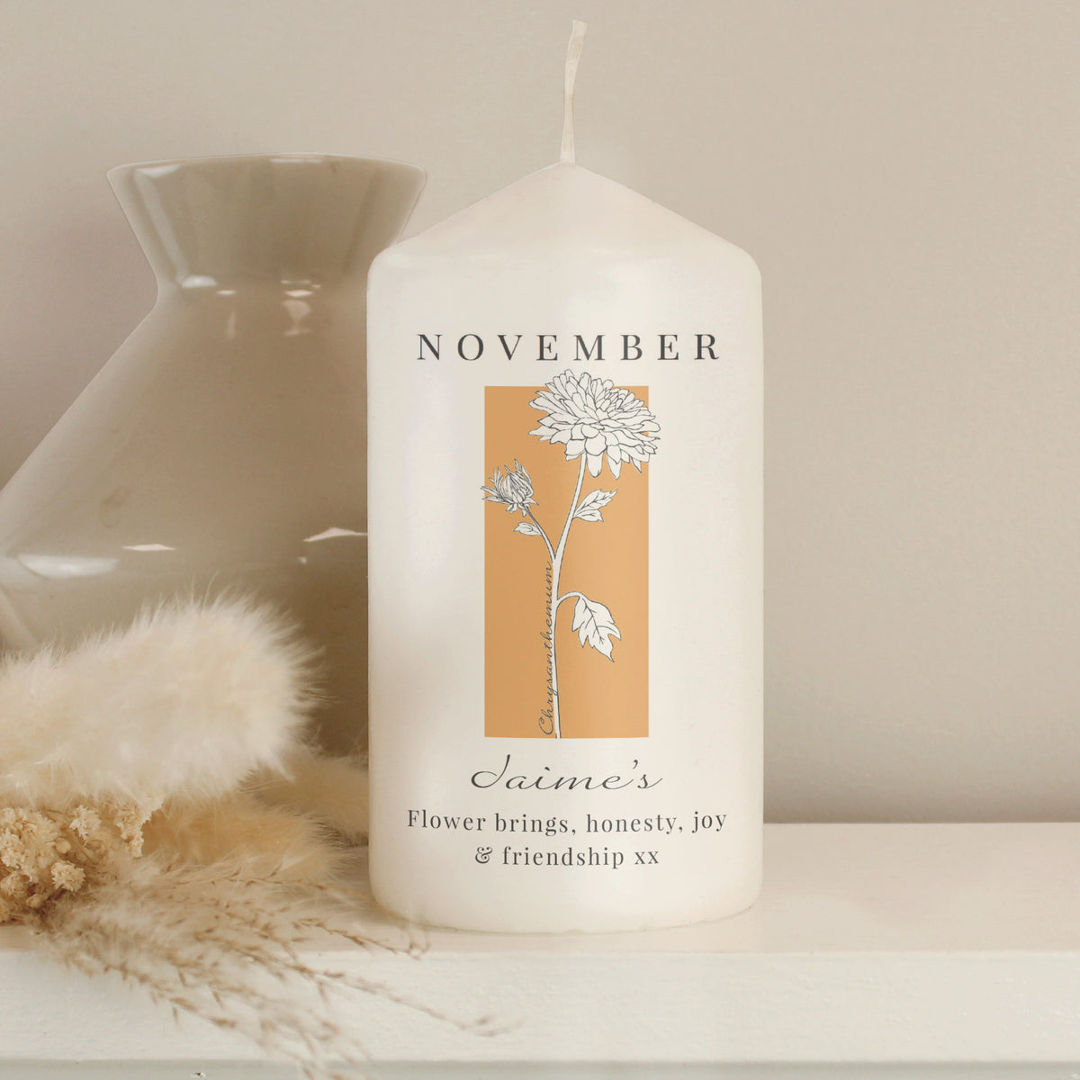 Personalised Birth Flower Pillar Candle | Handmade | A personal gift - Artfully Curated Creations and identify whats in the image