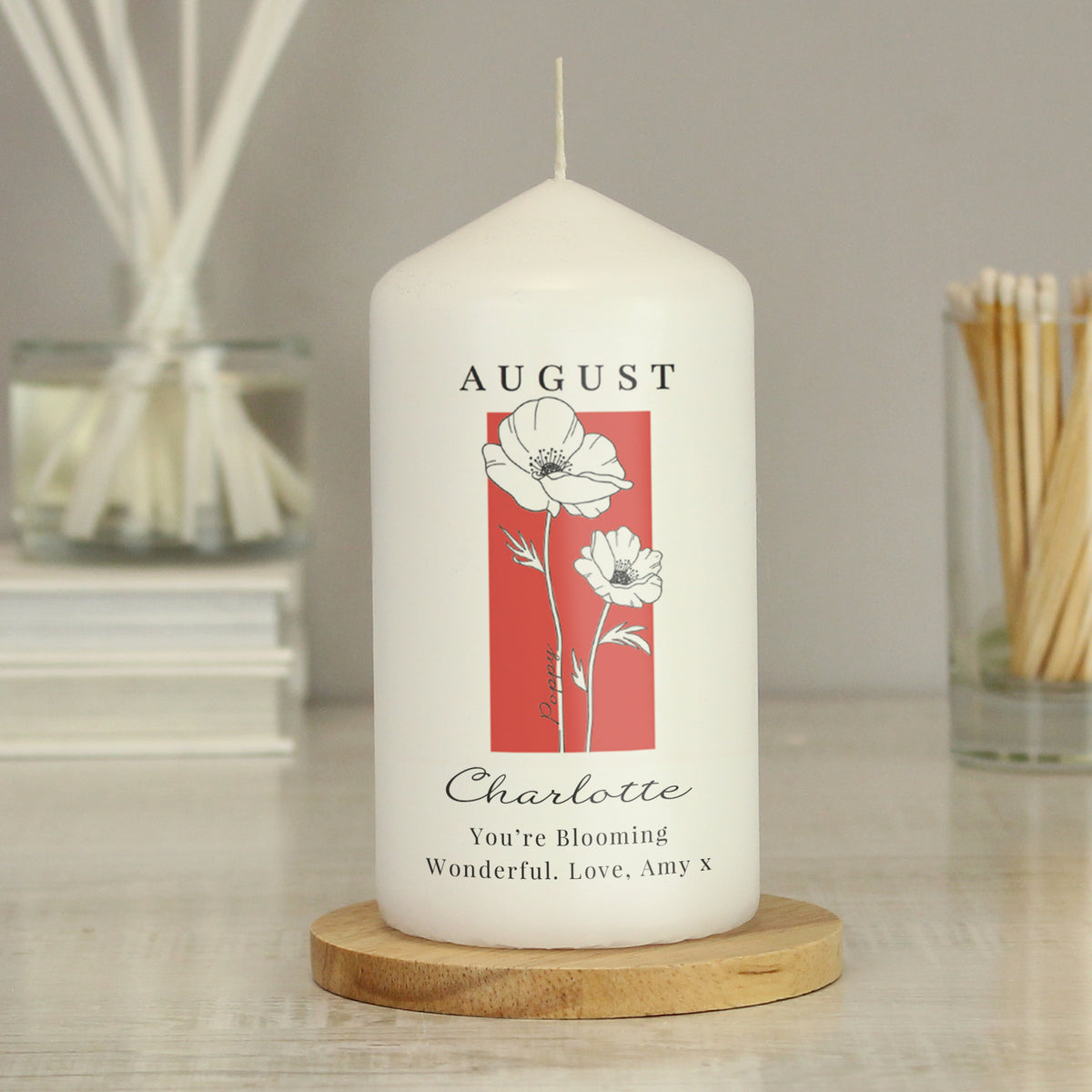 Personalised Birth Flower Pillar Candle | Handmade | A personal gift - Artfully Curated Creations and identify whats in the image