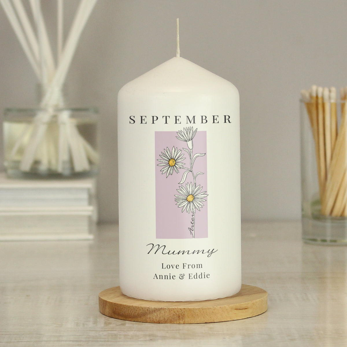 Personalised Birth Flower Pillar Candle | Handmade | A personal gift - Artfully Curated Creations and identify whats in the image