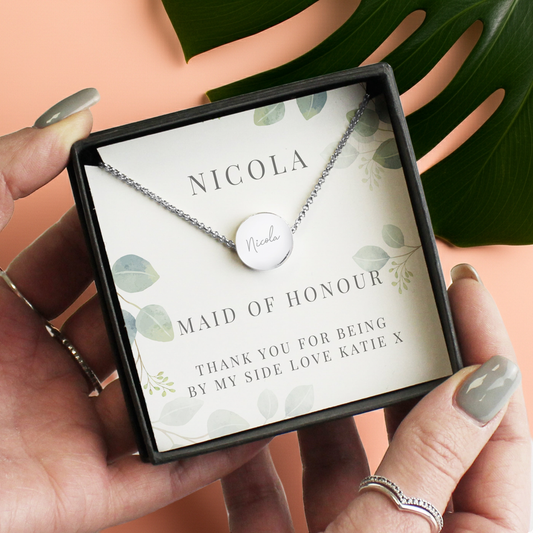 Personalised Disc Necklace|  Engraved Gift Box for Bridesmaids, Weddings & Special Occasions - Artfully Curated Creations and identify whats in the image