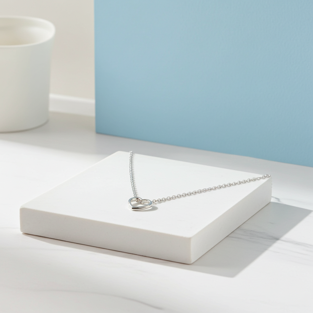 Personalised Sterling Silver Heart Necklace | Engraved Gift Box for Birthdays, Weddings & Mother’s Day - Artfully Curated Creations and identify whats in the image