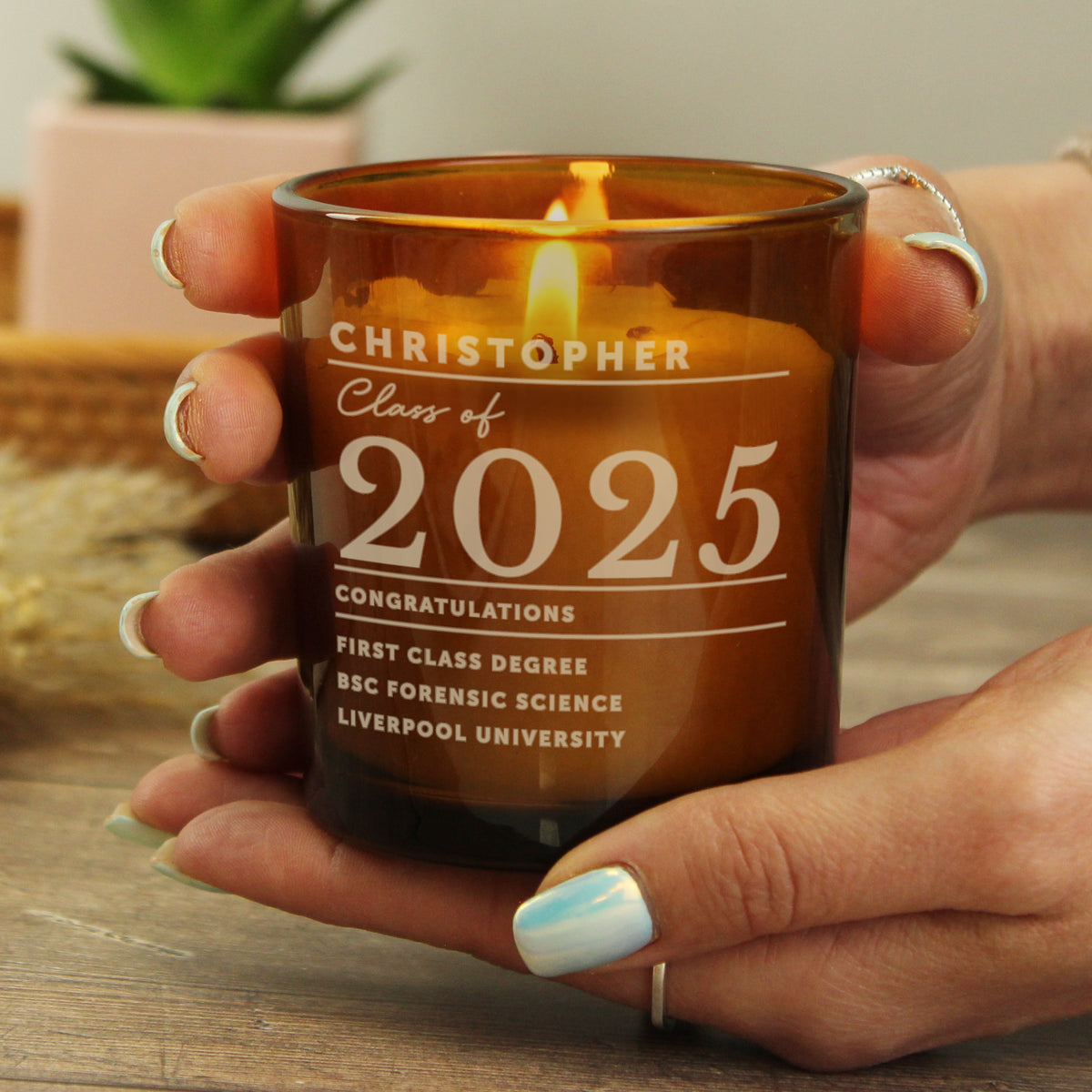 Personalised Amber Glass Vanilla Candle Jar | Graduation Keepsake Gift - Artfully Curated Creations and identify whats in the image