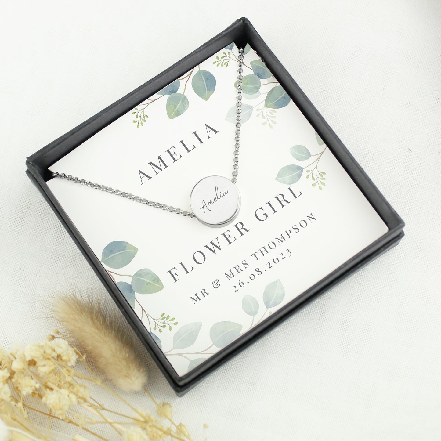 Personalised Disc Necklace|  Engraved Gift Box for Bridesmaids, Weddings & Special Occasions - Artfully Curated Creations and identify whats in the image