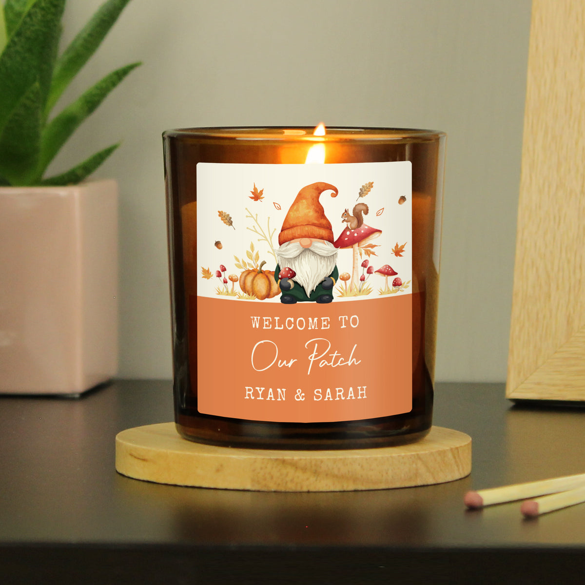 Personalised Amber Glass Vanilla Candle Jar | Custom Autumn & Halloween Gift - Artfully Curated Creations and identify whats in the image