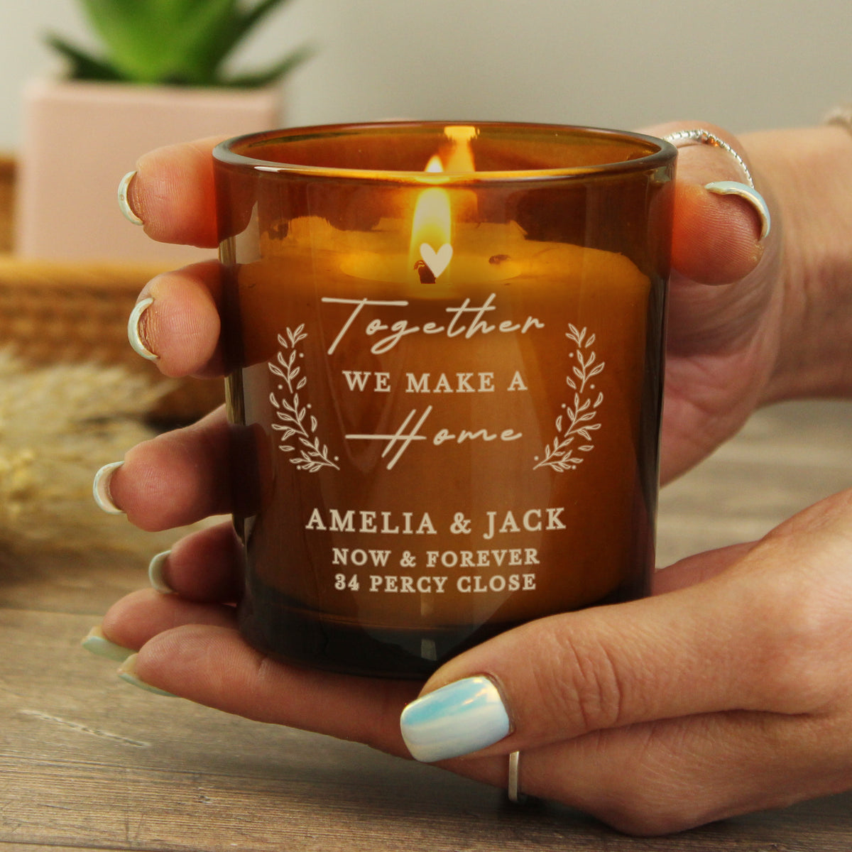 Personalised “Together We Make a Home” Amber Glass Candle Jar | Custom Housewarming Gift - Artfully Curated Creations and identify whats in the image