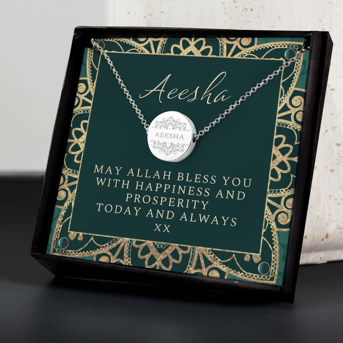 Personalised Eid Silver Disc Necklace | Engraved Pendant & Sentiment Card Gift Box - Artfully Curated Creations and identify whats in the image