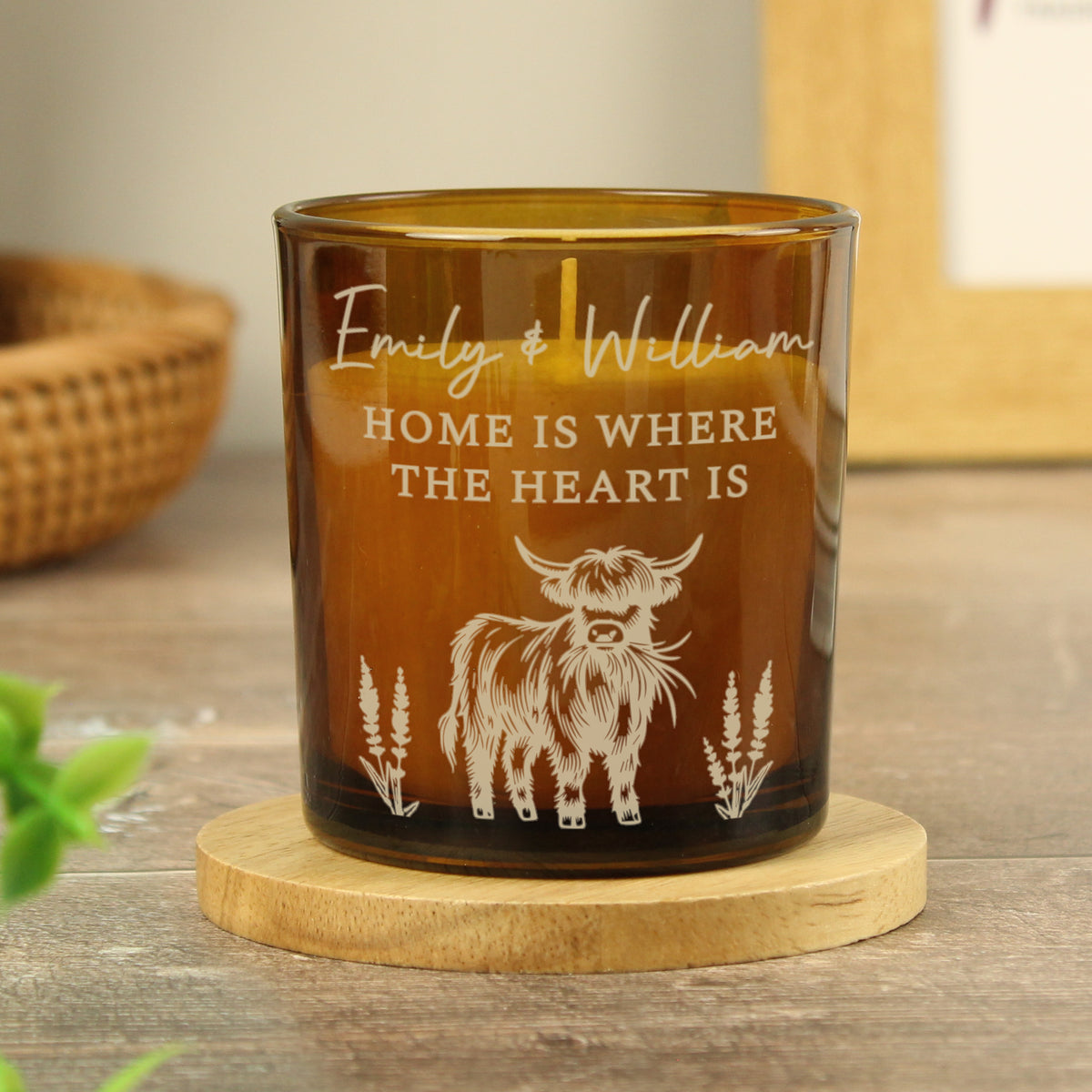 Highland Cow Personalised Amber Glass Vanilla Candle Jar | Custom Message Gift for Any Occasion - Artfully Curated Creations and identify whats in the image