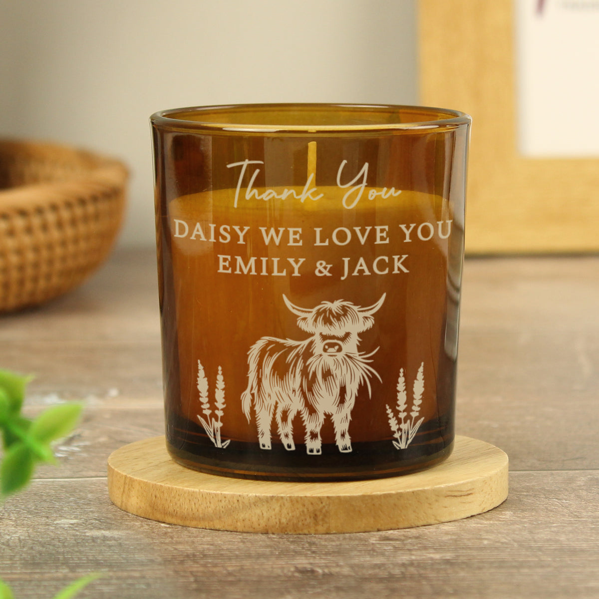 Highland Cow Personalised Amber Glass Vanilla Candle Jar | Custom Message Gift for Any Occasion - Artfully Curated Creations and identify whats in the image