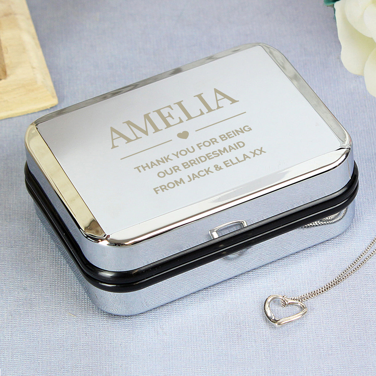 Personalised Sterling Silver Heart Necklace | Engraved Chrome Gift Box - Artfully Curated Creations and identify whats in the image
