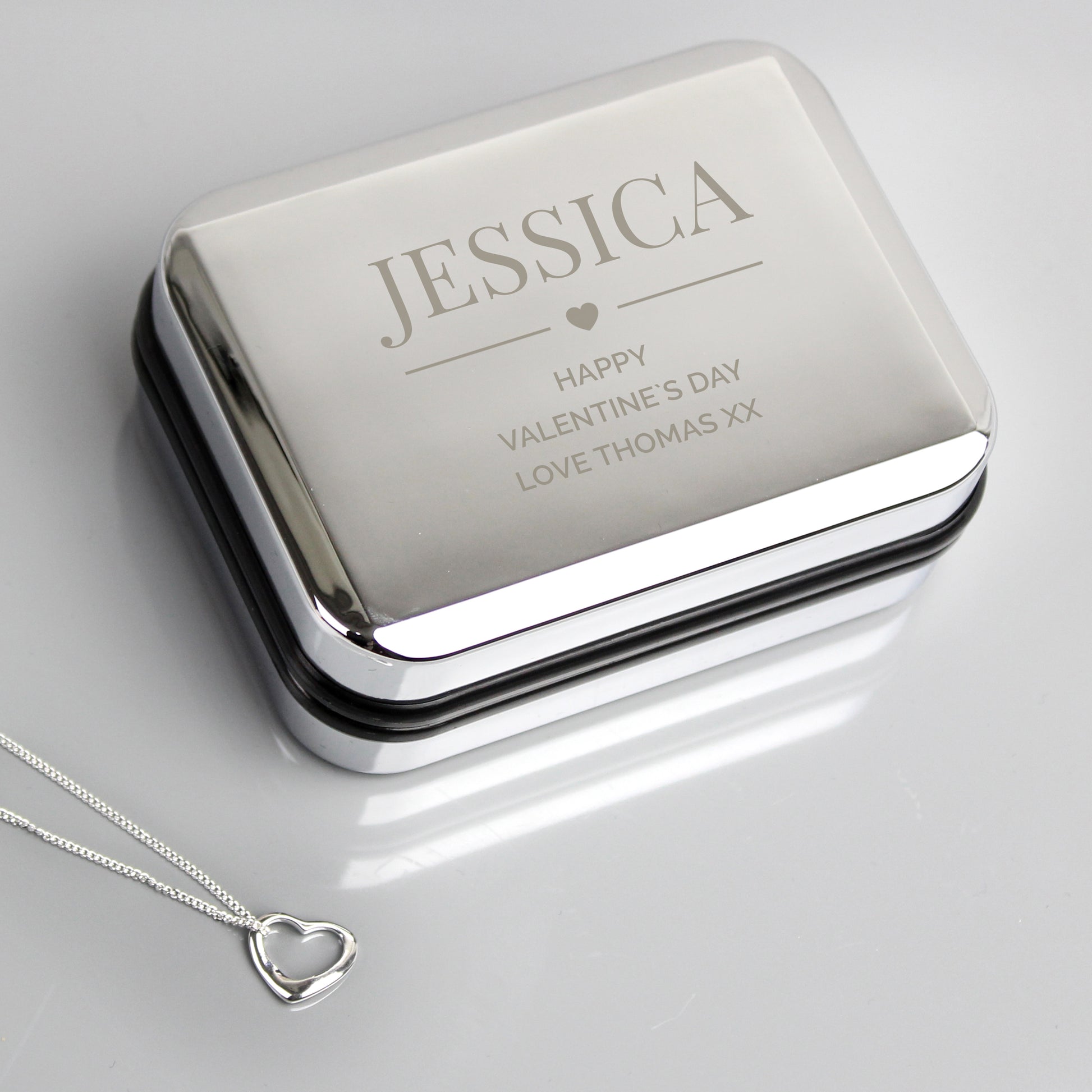 Personalised Sterling Silver Heart Necklace | Engraved Chrome Gift Box - Artfully Curated Creations and identify whats in the image