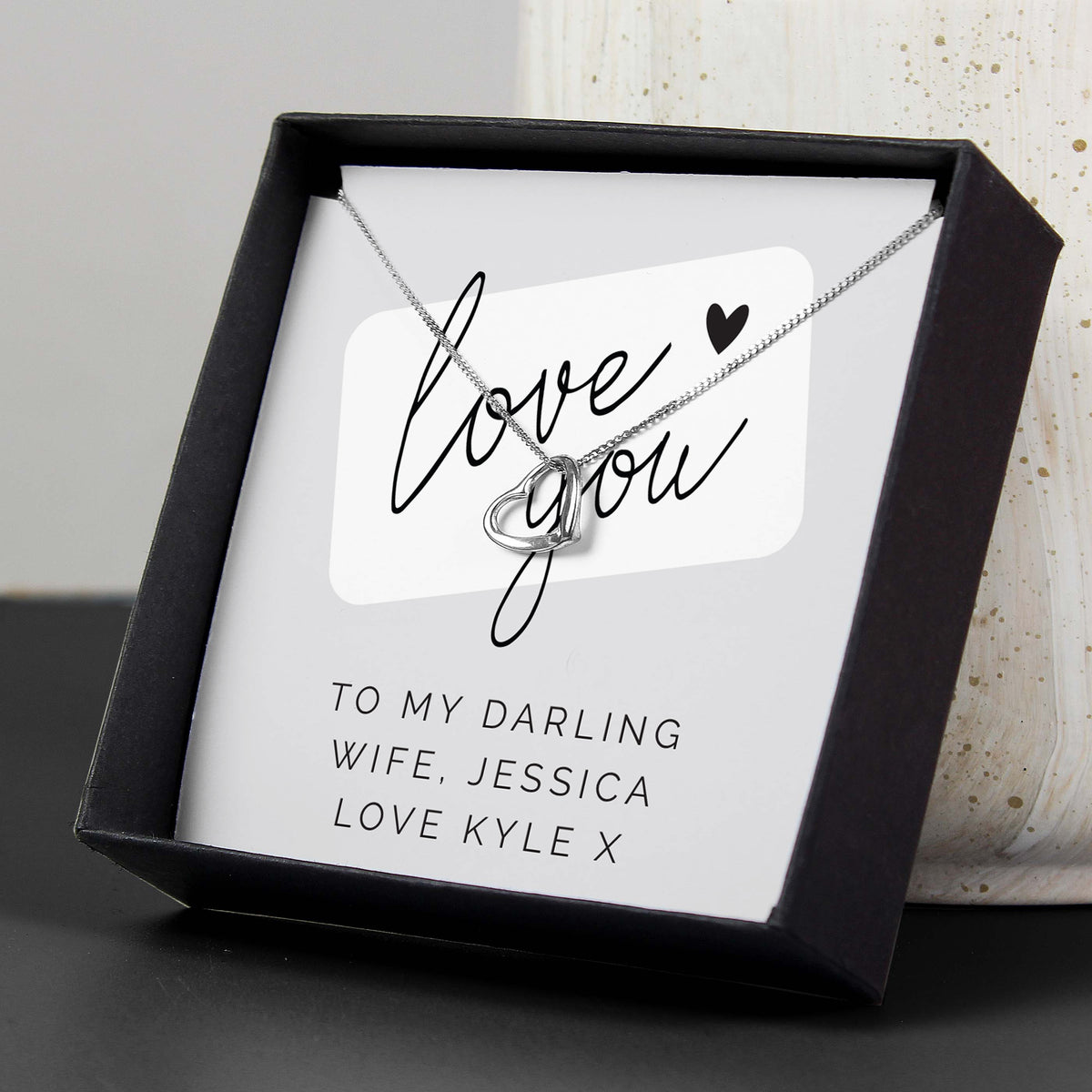 Personalised ‘Love You’ Silver Necklace | Engraved Sentiment Card & Gift Box - Artfully Curated Creations and identify whats in the image