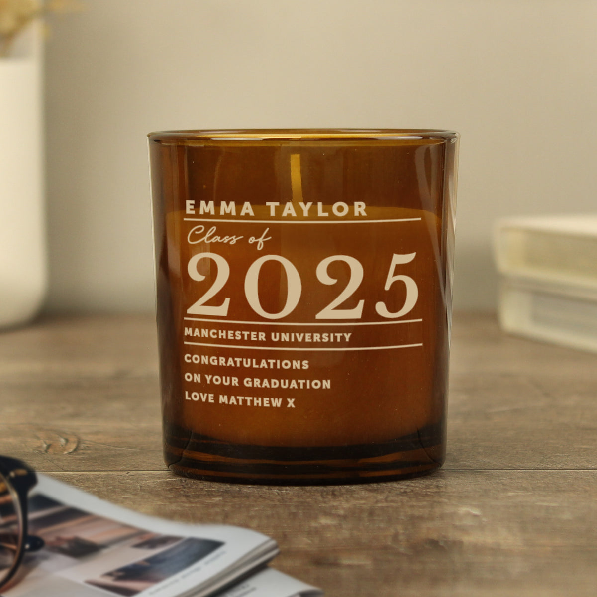 Personalised Amber Glass Vanilla Candle Jar | Graduation Keepsake Gift - Artfully Curated Creations and identify whats in the image