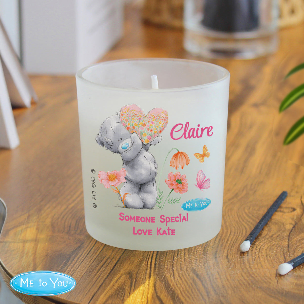 Personalised Me to You Candle Jar | Tatty Teddy Floral Design - Artfully Curated Creations and identify whats in the image