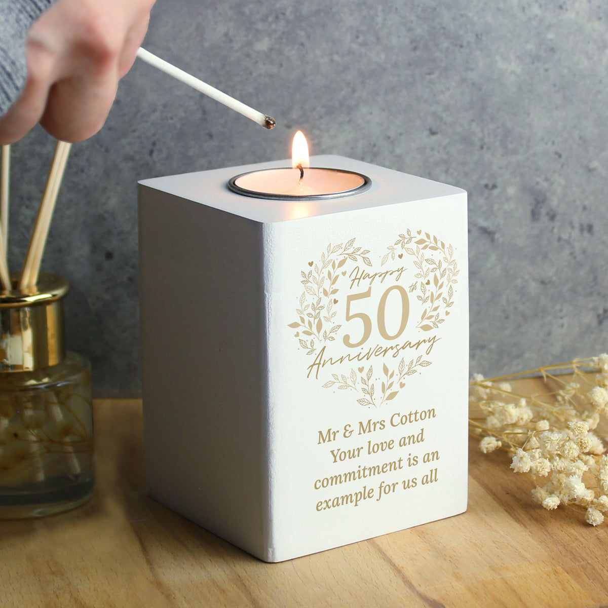 Personalised 50th Anniversary Tealight Holder | Golden Anniversary Keepsake - Artfully Curated Creations and identify whats in the image
