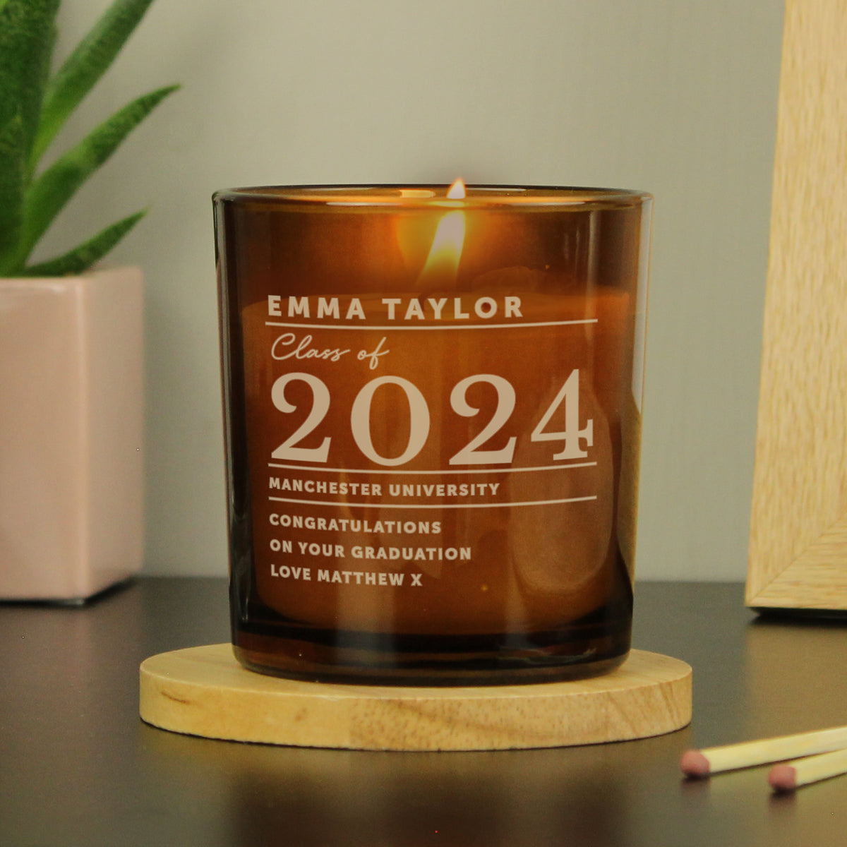 Personalised Amber Glass Vanilla Candle Jar | Graduation Keepsake Gift - Artfully Curated Creations and identify whats in the image