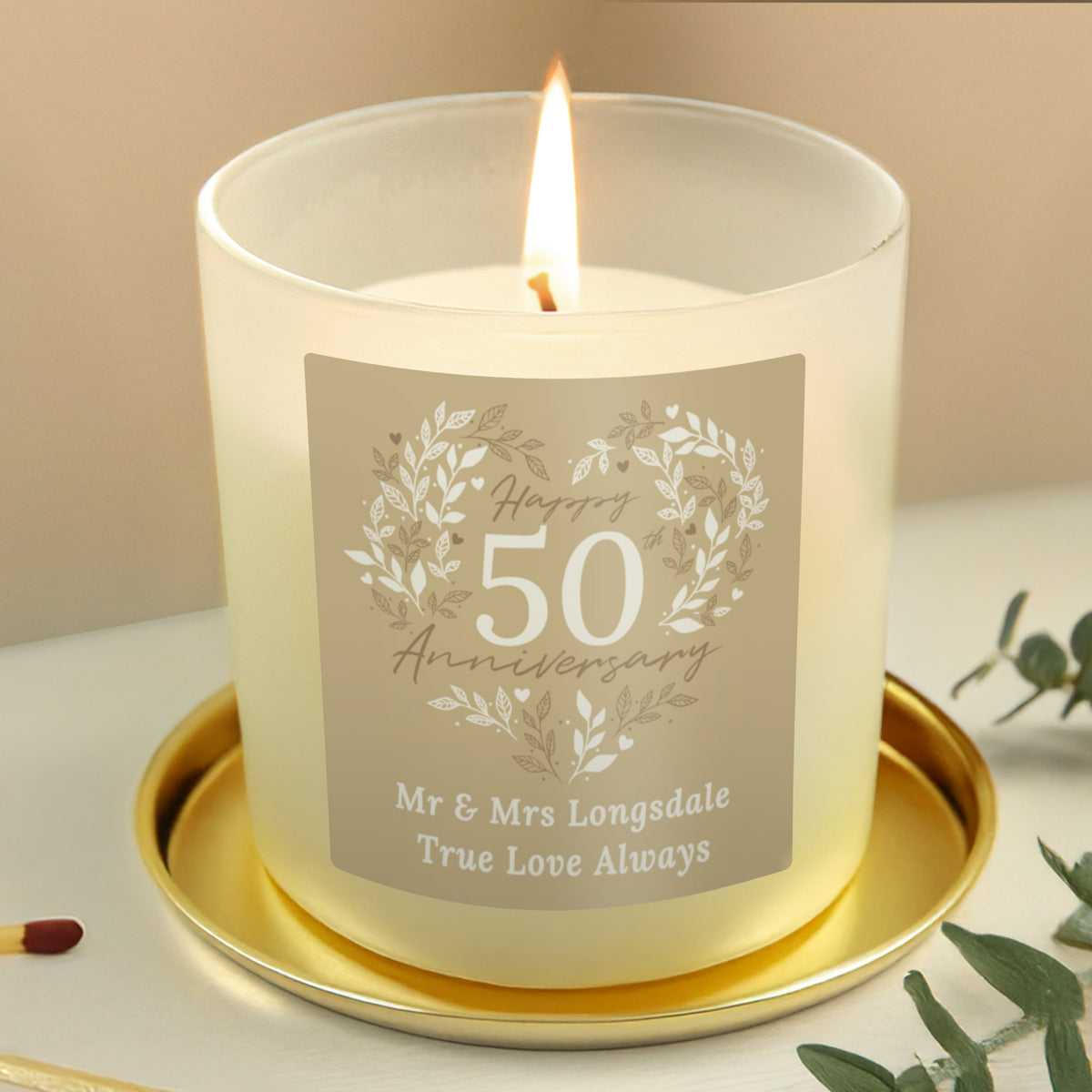 Personalised 50th Anniversary Vanilla Candle Jar | Golden Anniversary Keepsake - Artfully Curated Creations and identify whats in the image