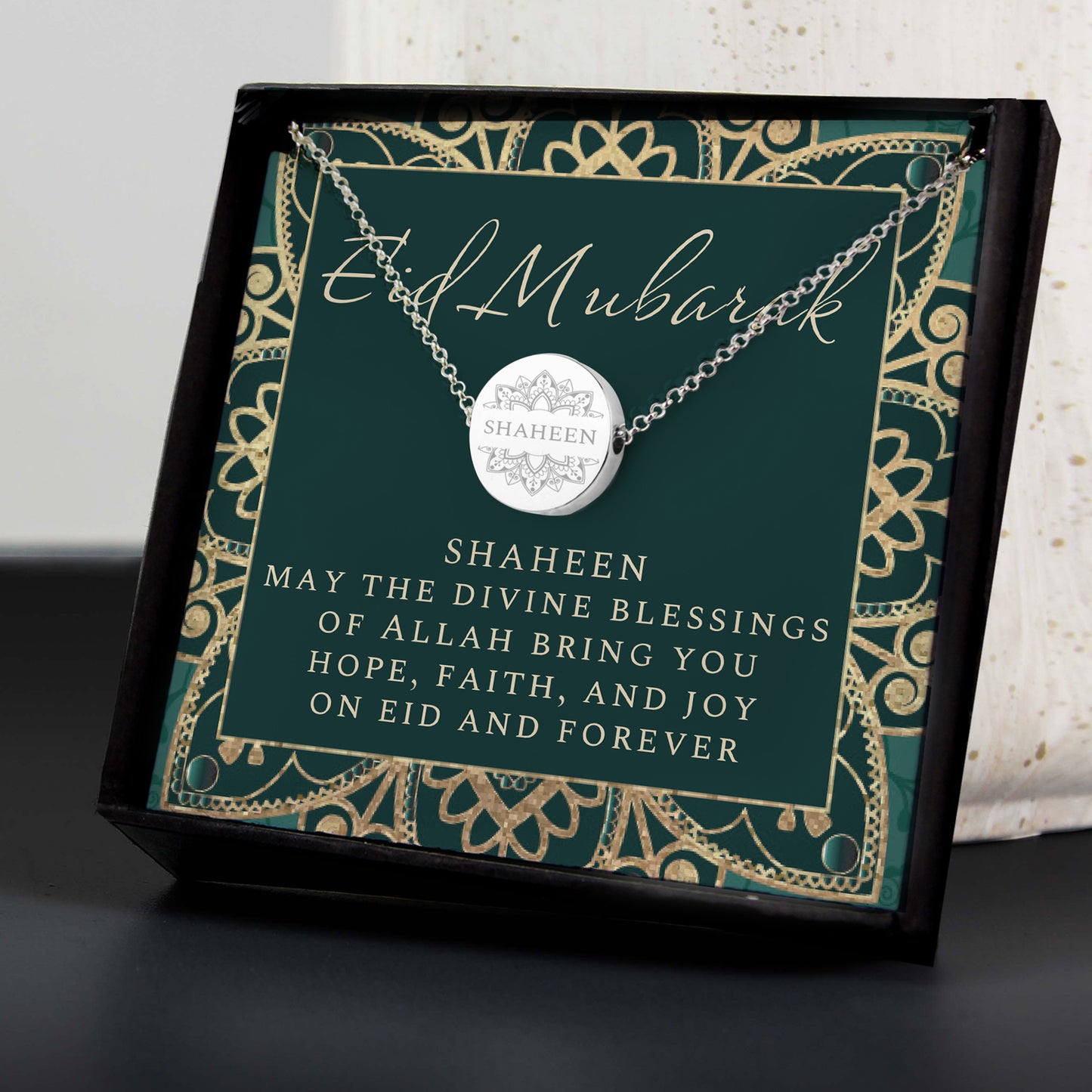 Personalised Eid Silver Disc Necklace | Engraved Pendant & Sentiment Card Gift Box - Artfully Curated Creations and identify whats in the image