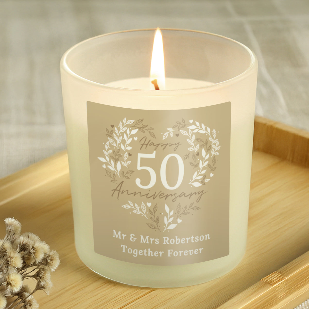 Personalised 50th Anniversary Vanilla Candle Jar | Golden Anniversary Keepsake - Artfully Curated Creations and identify whats in the image