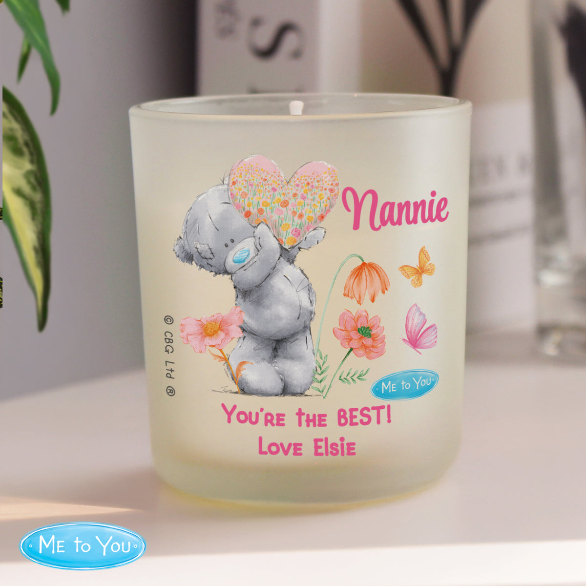 Personalised Me to You Candle Jar | Tatty Teddy Floral Design - Artfully Curated Creations and identify whats in the image