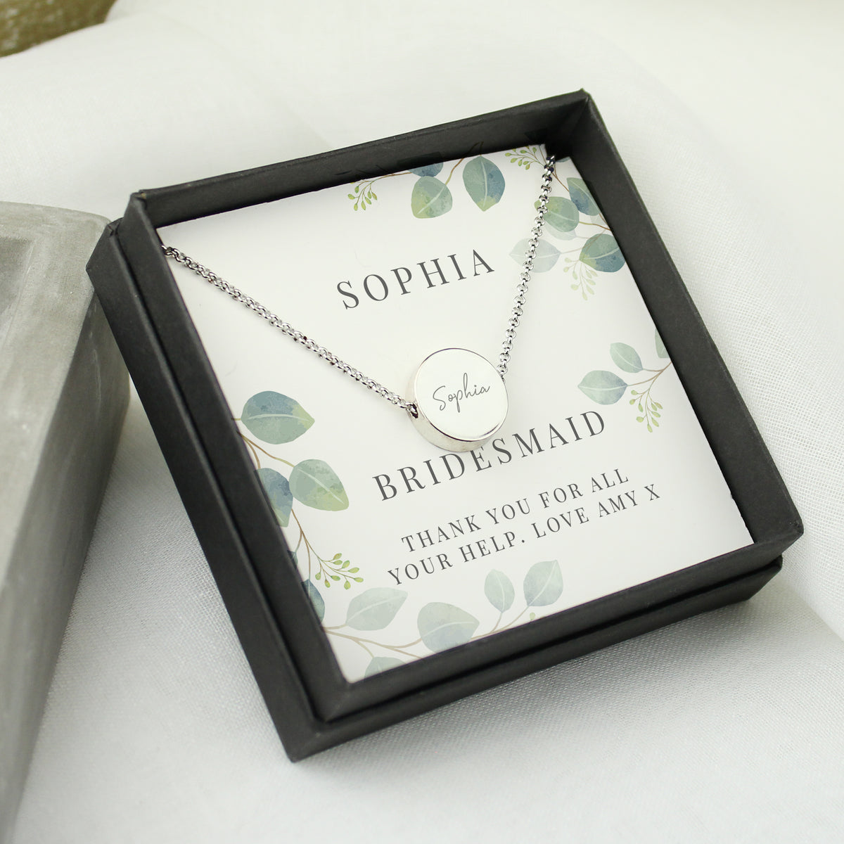 Personalised Disc Necklace|  Engraved Gift Box for Bridesmaids, Weddings & Special Occasions - Artfully Curated Creations and identify whats in the image