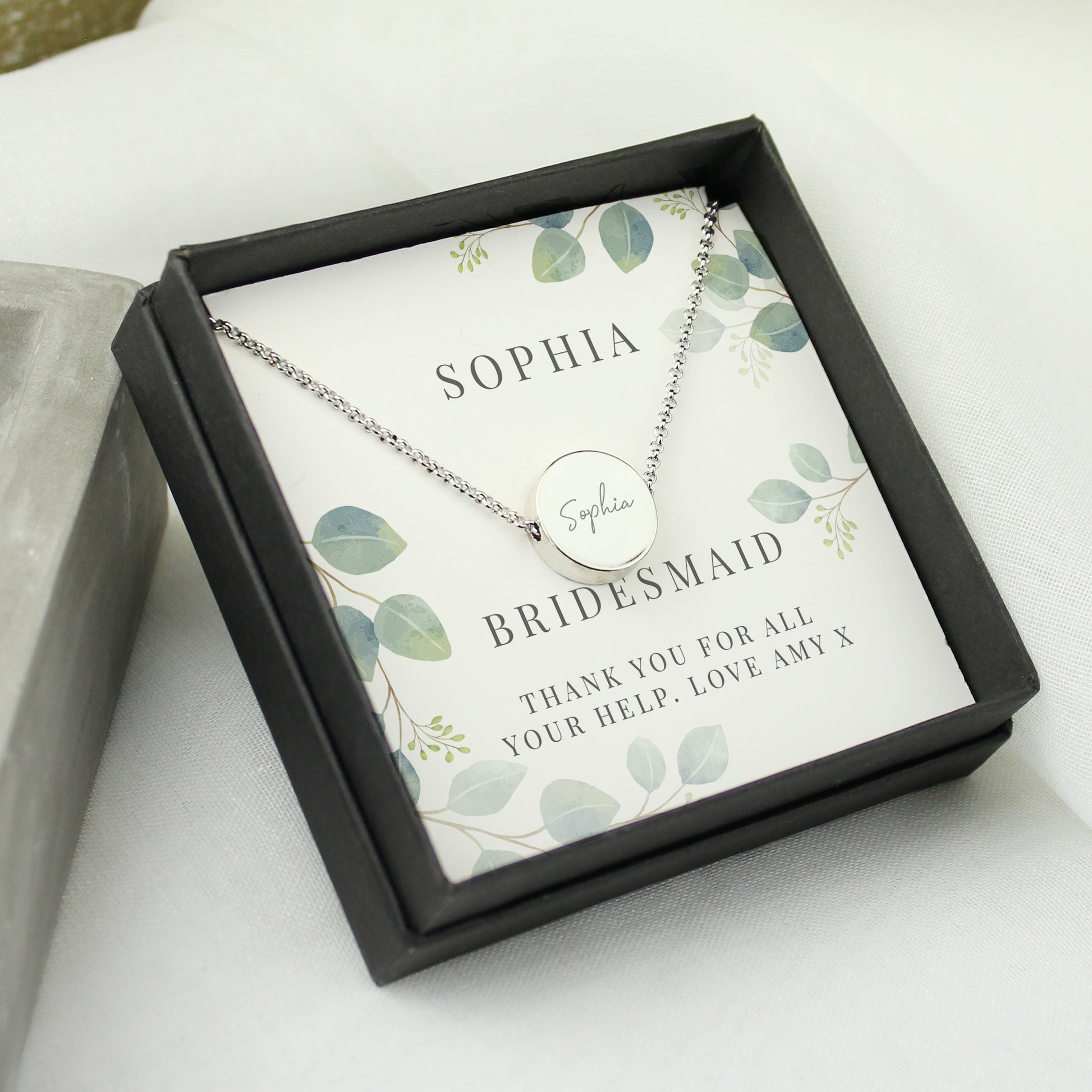 Personalised Disc Necklace|  Engraved Gift Box for Bridesmaids, Weddings & Special Occasions - Artfully Curated Creations and identify whats in the image