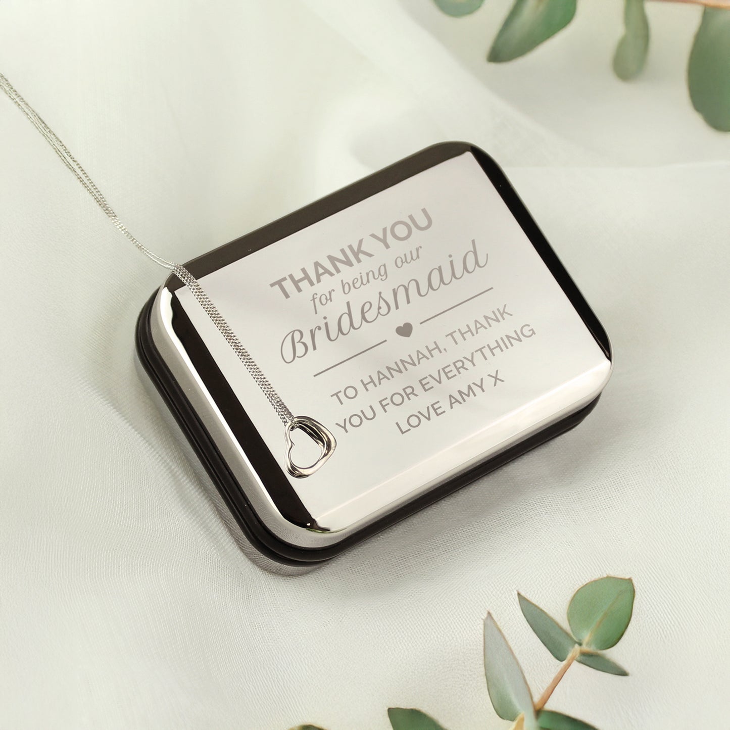Personalised Bridesmaid Heart Necklace | Engraved Chrome Gift Box - Artfully Curated Creations and identify whats in the image