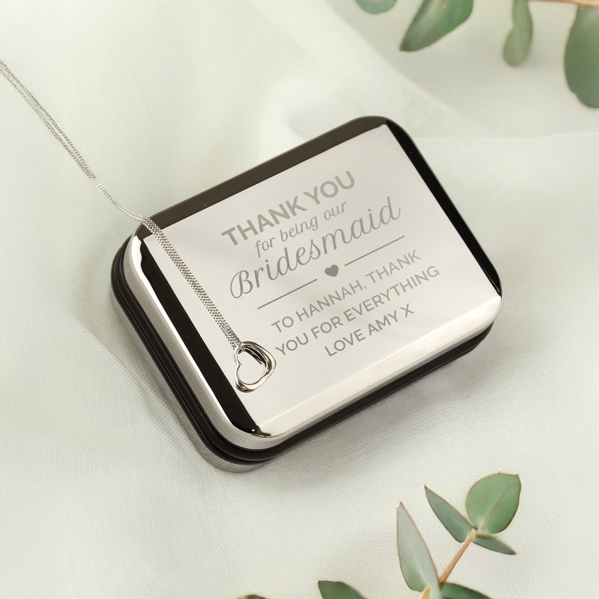 Personalised Bridesmaid Heart Necklace | Engraved Chrome Gift Box - Artfully Curated Creations and identify whats in the image