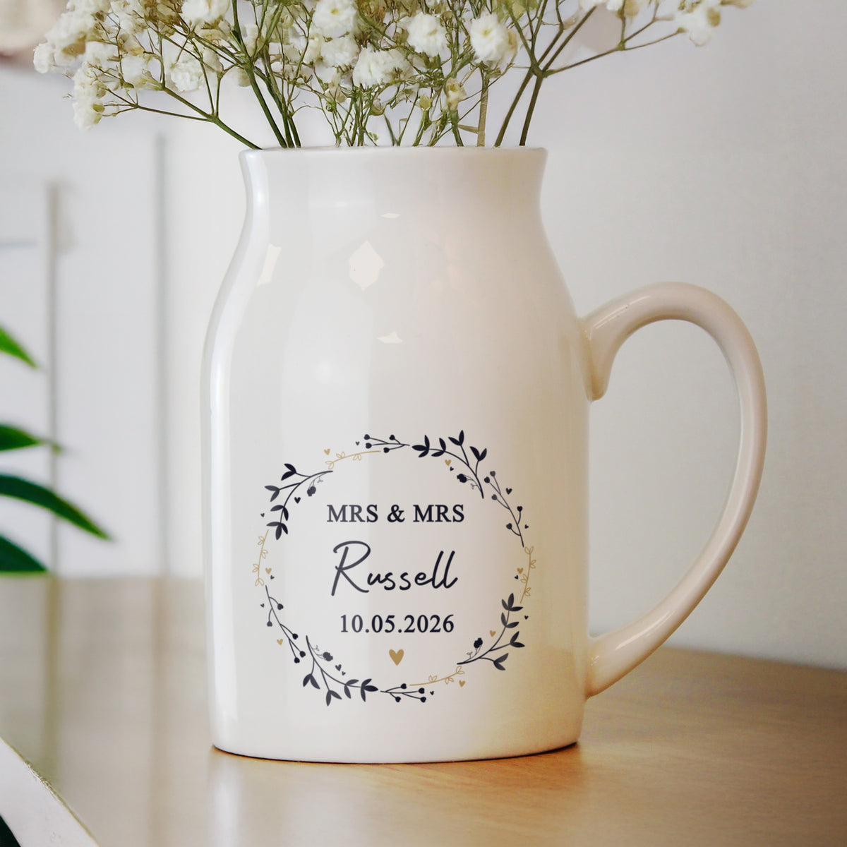 Personalised Floral Wreath Jug Vase | A Stylish Decorative Keepsake for Any Home - Artfully Curated Creations and identify whats in the image