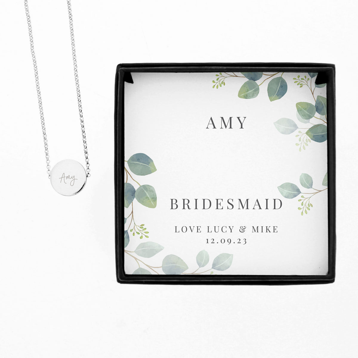 Personalised Disc Necklace|  Engraved Gift Box for Bridesmaids, Weddings & Special Occasions - Artfully Curated Creations and identify whats in the image