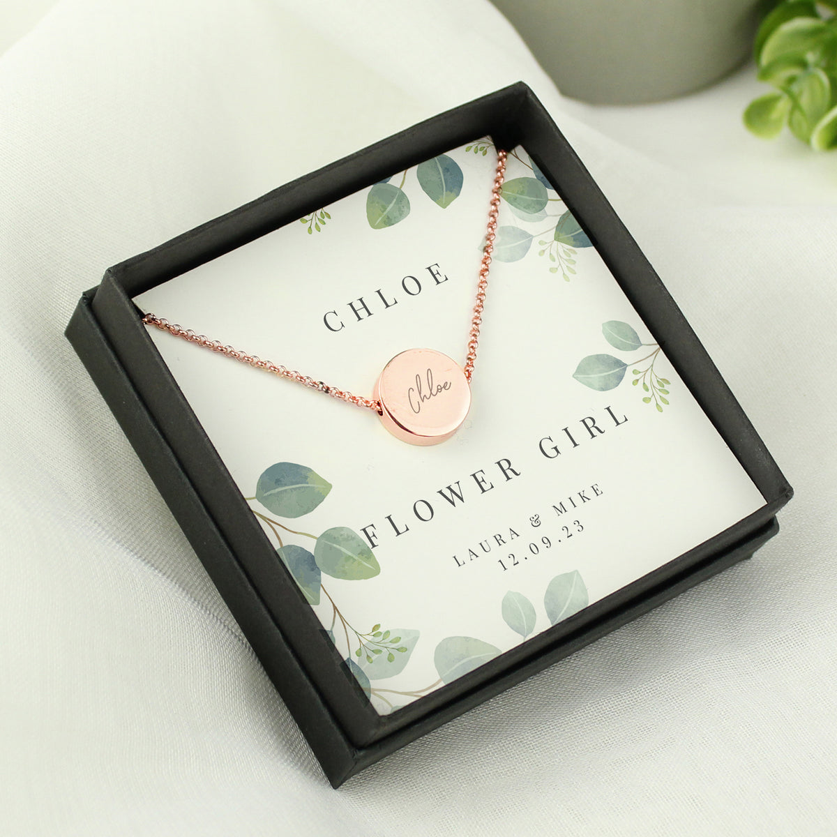 Personalised Disc Necklace|  Engraved Gift Box for Bridesmaids, Weddings & Special Occasions - Artfully Curated Creations and identify whats in the image