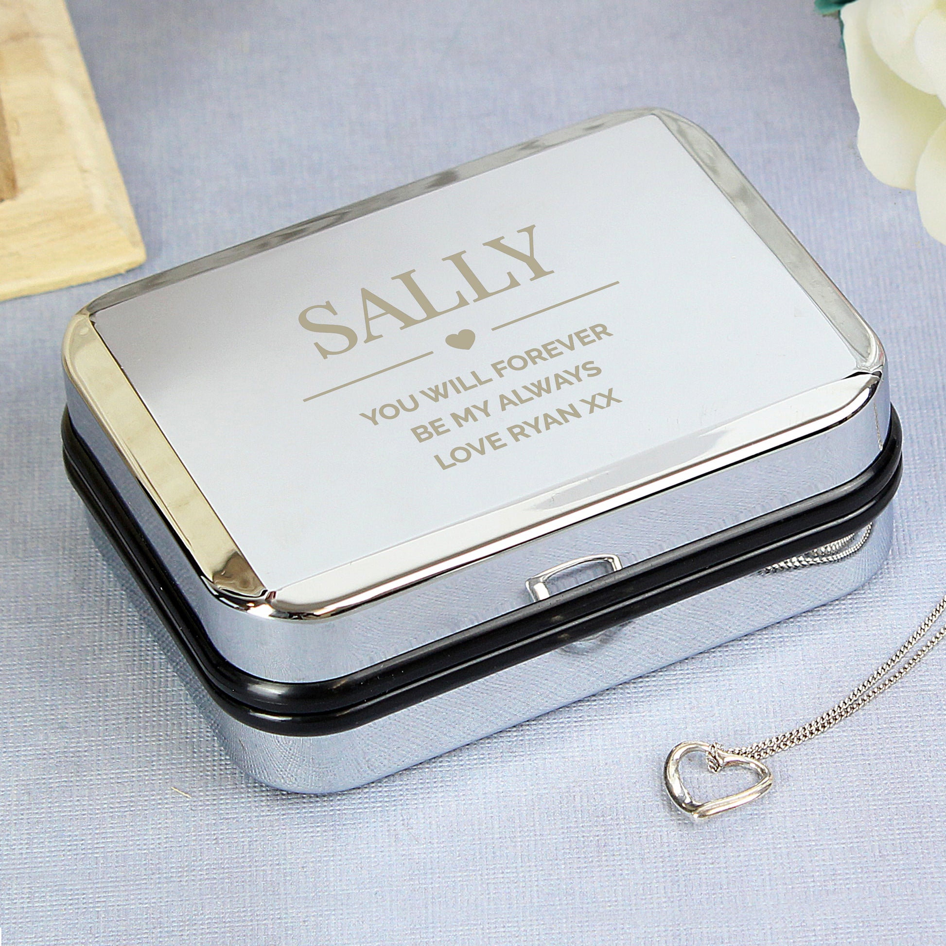 Personalised Sterling Silver Heart Necklace | Engraved Chrome Gift Box - Artfully Curated Creations and identify whats in the image
