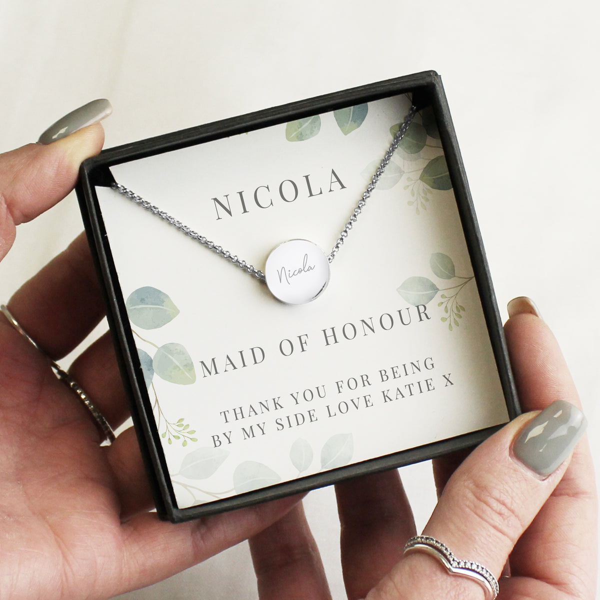 Personalised Disc Necklace|  Engraved Gift Box for Bridesmaids, Weddings & Special Occasions - Artfully Curated Creations and identify whats in the image