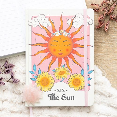 The Sun Celestial A5 Notebook - Artfully Curated Creations and identify whats in the image