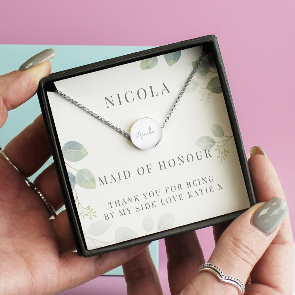 Personalised Disc Necklace|  Engraved Gift Box for Bridesmaids, Weddings & Special Occasions - Artfully Curated Creations and identify whats in the image