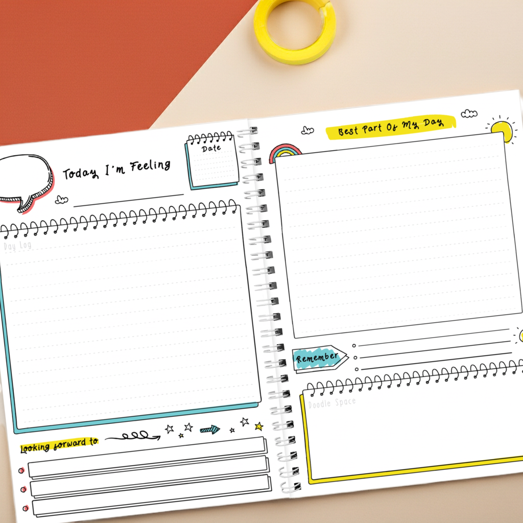 Notebook with various writing prompts on a colorful background