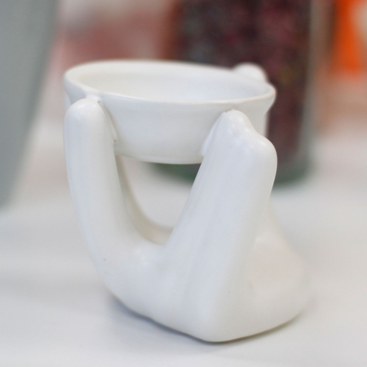 Need a Hand Oil Burner - Artfully Curated Creations and identify whats in the image